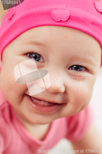 Image of smiling baby girl
