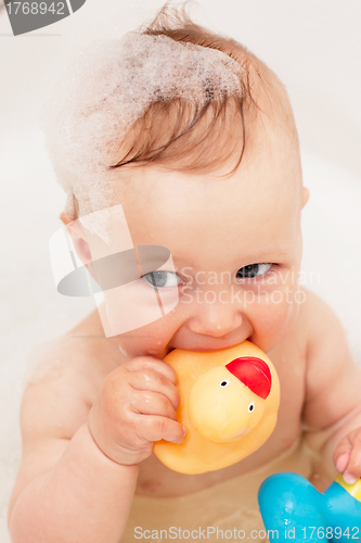 Image of Adorable bath baby with soap suds