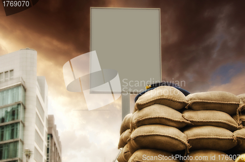 Image of Checkpoint with blank Signboard and Sandbags