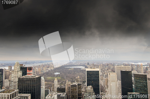 Image of Dramatic Sky above Central Park in Manhattan with Skyscrapers