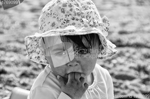 Image of Baby Girl relaxing on the Beach