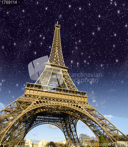 Image of Stars and Night Sky above Eiffel Tower in Paris