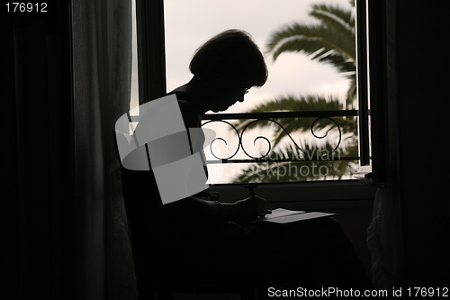 Image of Woman writing diary
