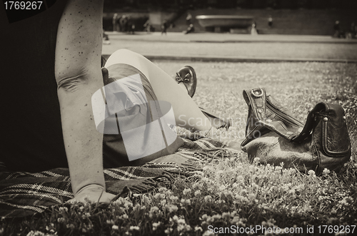 Image of Woman relaxing in the Park