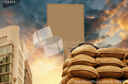 Image of Checkpoint with blank Signboard and Sandbags