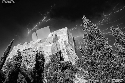 Image of Old Medieval Castle with Vegetation and Sky