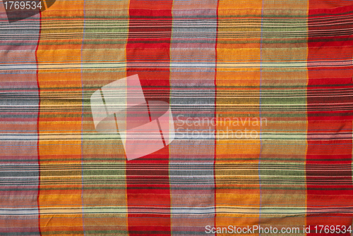 Image of Multicoloured fabric with geometric pattern