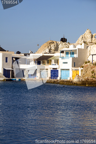 Image of fisherman houses rock cliffs  Mediterranean Sea Firopotamos Milo
