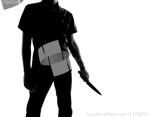 Image of silhouette of a man with knife