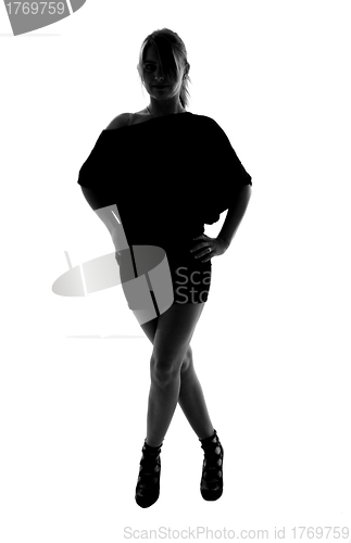 Image of stylish silhouette of caucasian woman posin