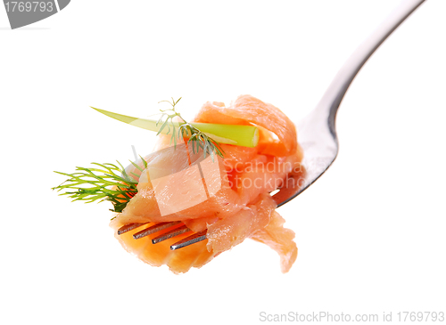 Image of smoked salmon on a fork
