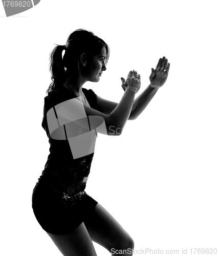 Image of stylish silhouette of caucasian woman posin