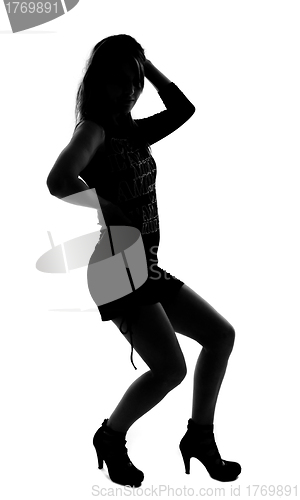 Image of stylish silhouette of caucasian woman posin