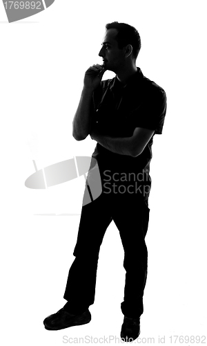 Image of Silhouette of a young man thinking