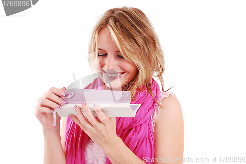 Image of blonde woman holding gift box 