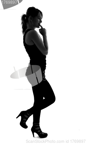 Image of stylish silhouette of caucasian woman posin