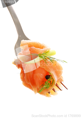 Image of smoked salmon on a fork 