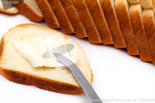 Image of Slices of Wheat Bread with Butter