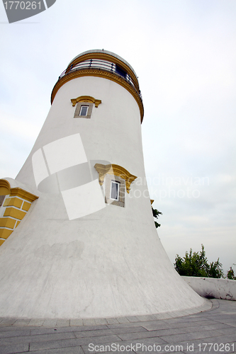 Image of The Guia Fortress white tower in Macau
