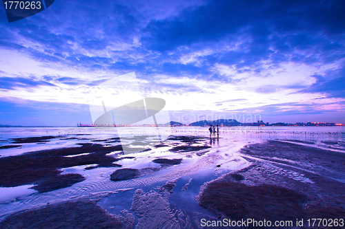 Image of Sunset along the coast at dusk