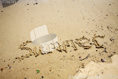 Image of Summer words on sand