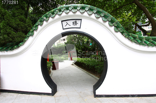 Image of Chinese door in garden