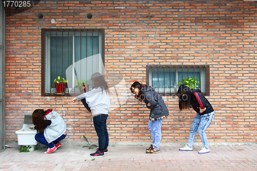 Image of Asian woman queuing for toilet