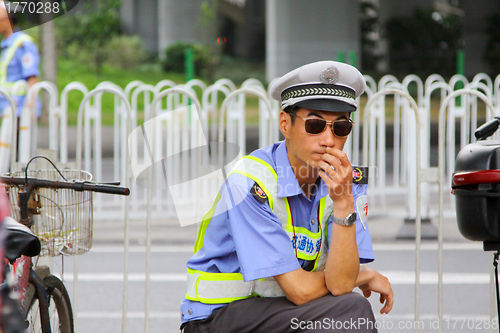 Image of Guangzhou policeman on street, China