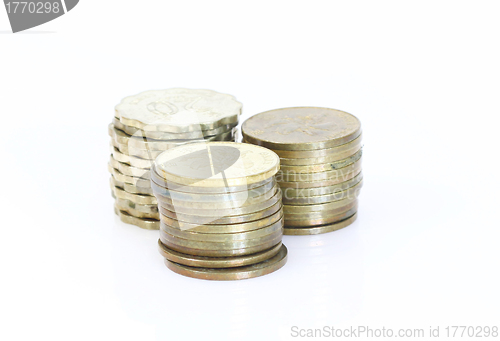 Image of Stack of coins isolated on white background