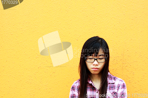 Image of A sad asian woman