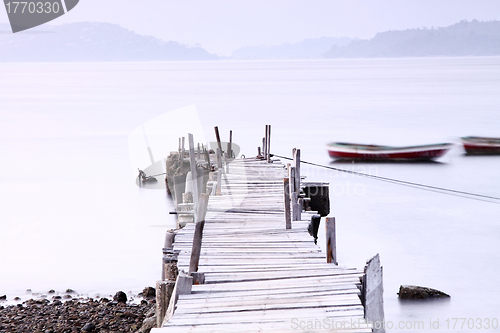 Image of Sunset pier under long exposure, high key image.