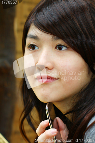Image of Asian woman with smart phone