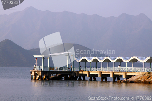 Image of Dock to pier under blue sky in Hong Kong