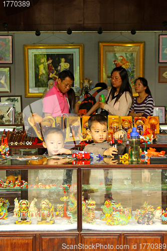 Image of Children as shopkeepers in China