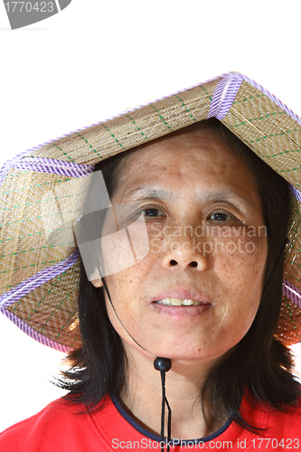 Image of A 50s asian woman wearing hat