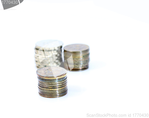 Image of Stack of coins isolated on white background