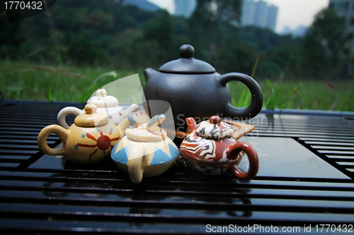 Image of Chinese tea set with tea pots