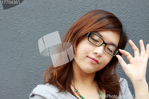 Image of Asian businesswoman with glasses