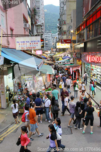 Image of An old street with moving people in Hong Kong