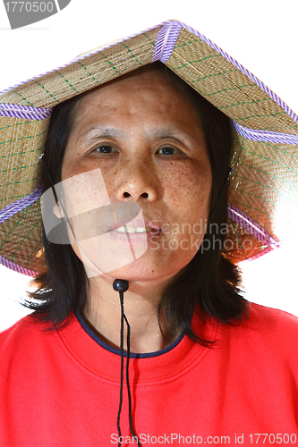 Image of A 50s asian woman wearing hat