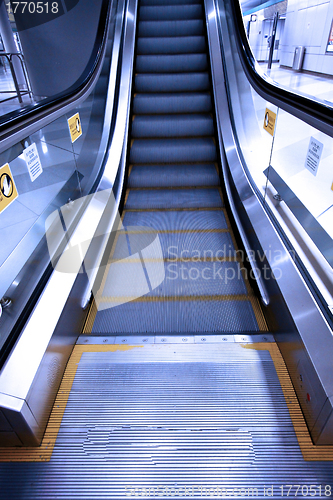 Image of Moving escalator in a subway station