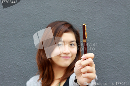 Image of Asian woman with an idea