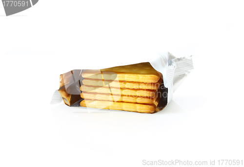 Image of Stack of biscuits in bag isolated on white background