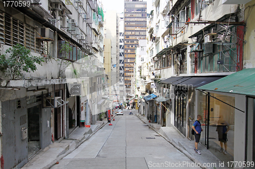 Image of Old street and modern buildings in Hong Kong