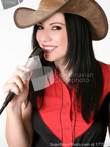 Image of Friendly country girl with a microphone