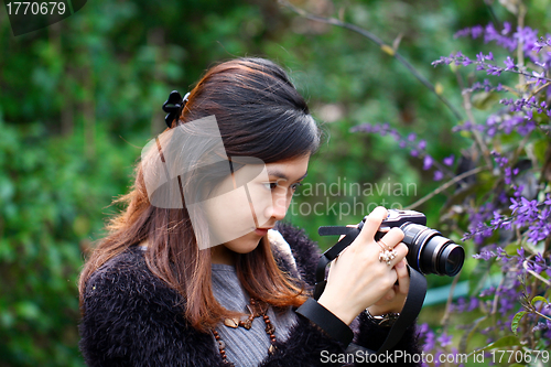 Image of Female photographer outdoor