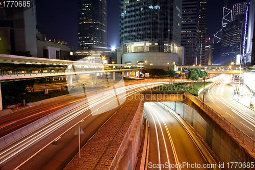 Image of Traffic in modern city at night