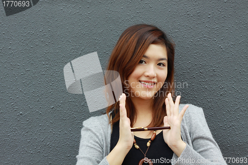 Image of Asian woman with an idea