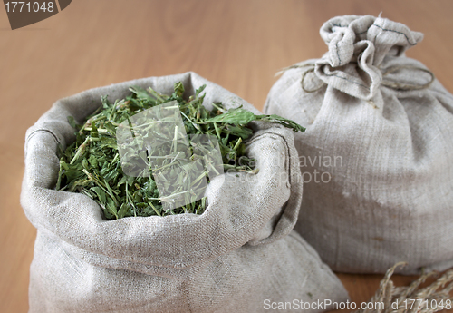 Image of Dried herbs in linen bags