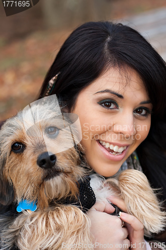 Image of Hispanic Woman with Dog